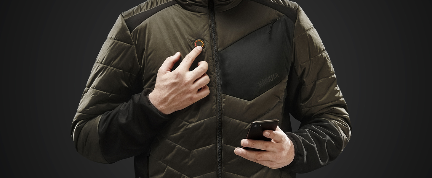 Kleidung mit Wärme, hier abgebildet eine Härkila Heat Jacke mit elektrischer Wärme